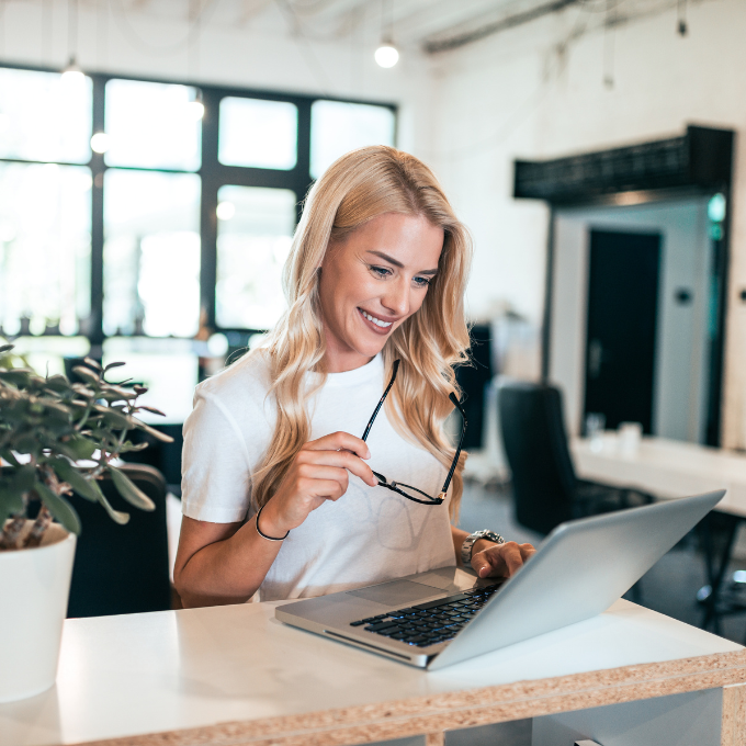 Woman smiling laptop